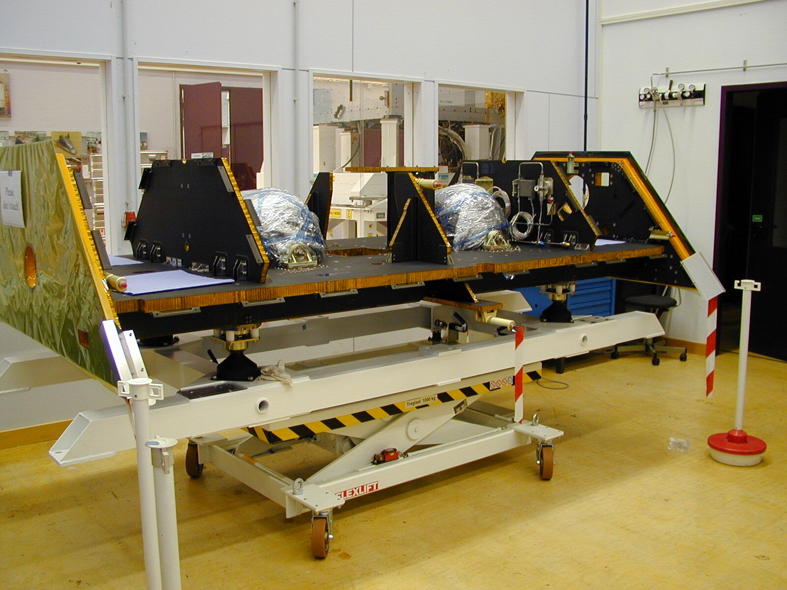 Empty shell of GRACE satellite during construction.