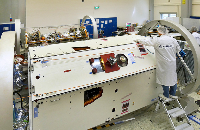 A technician inspects one of the two satellites for NASA’s Gravity Recovery and Climate Experiment Follow-On (GRACE-FO) mission at the Airbus Defence and Space manufacturing facility in Friedrichshafen, Germany.